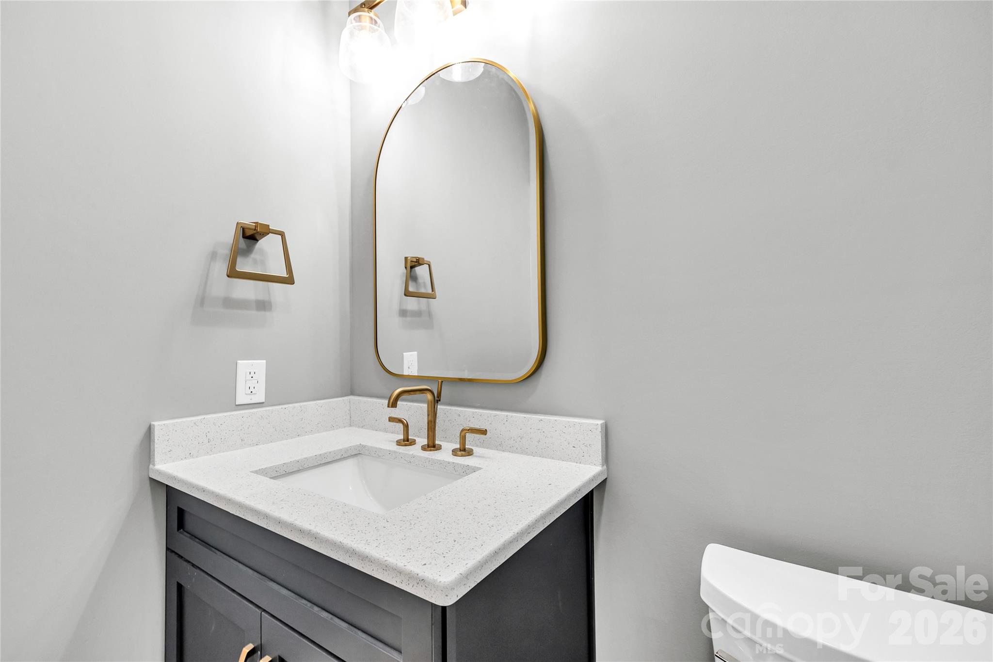 0 Trinity Court Salisbury, NC 28147 - Photo 17 of 38 a bathroom with a sink vanity and a mirror