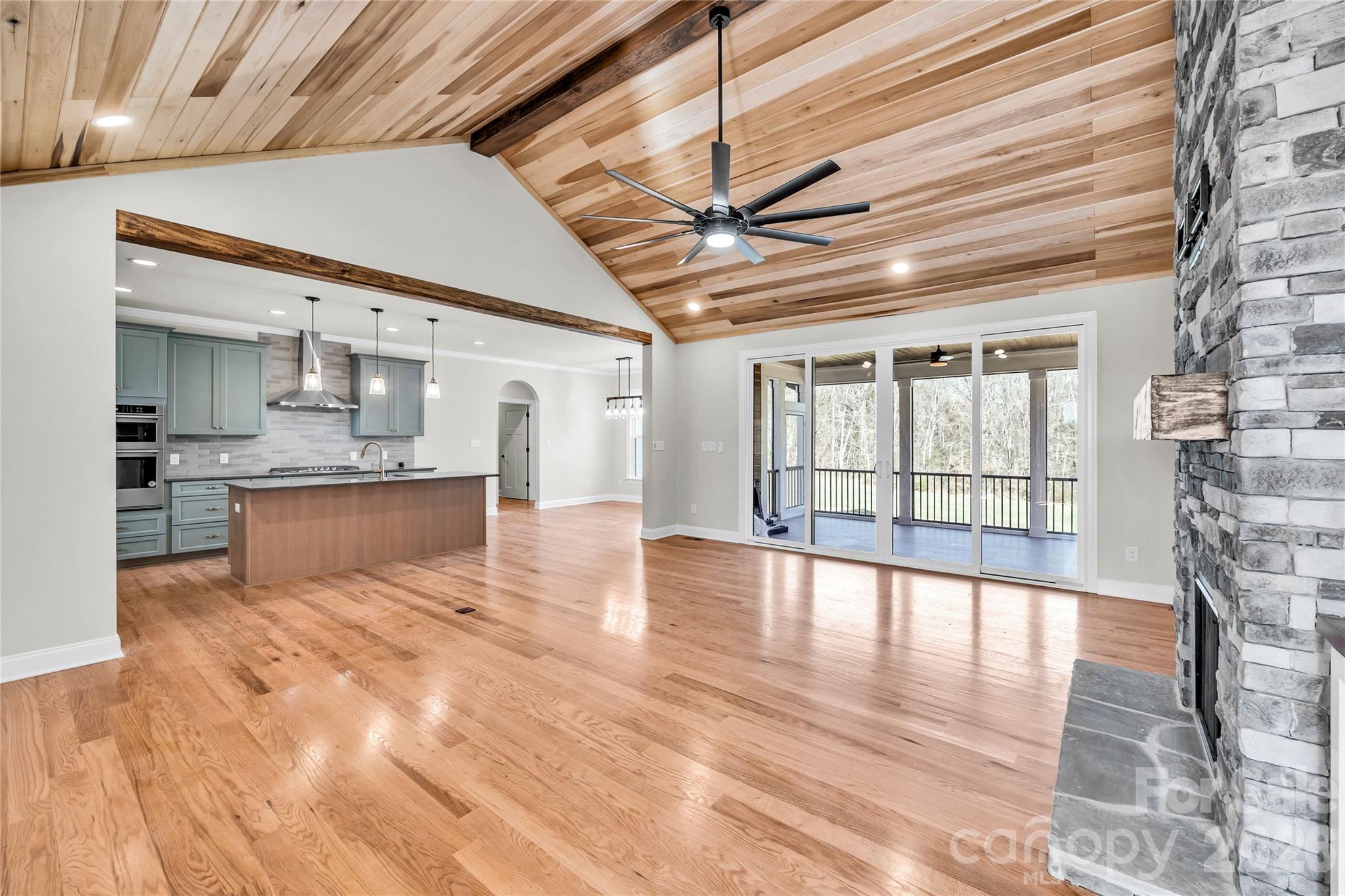 0 Trinity Court Salisbury, NC 28147 - Photo 3 of 38 a view of an empty room with wooden floor and a window