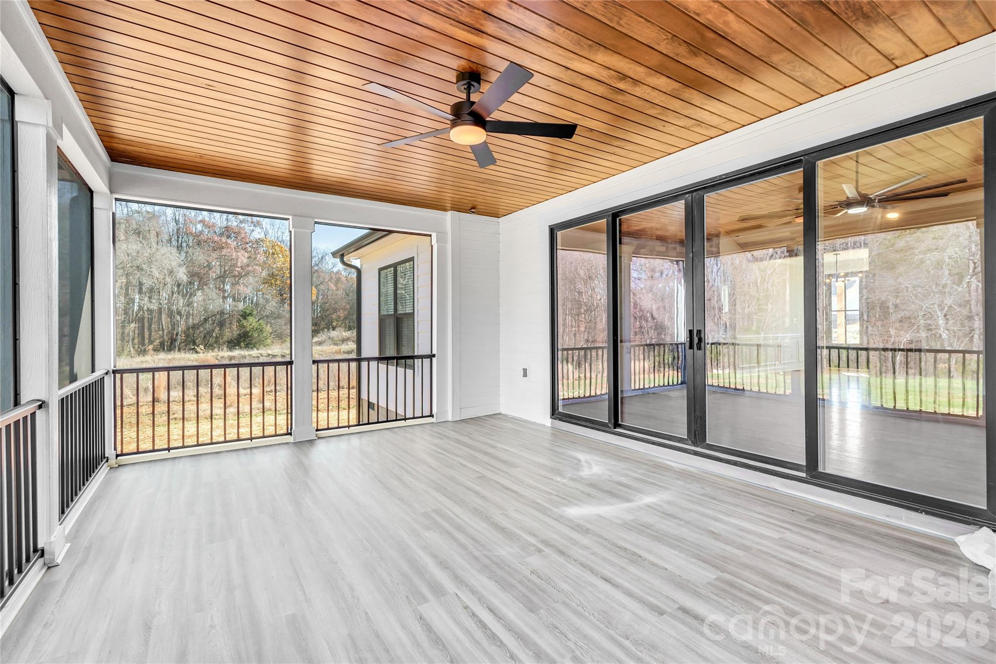0 Trinity Court Salisbury, NC 28147 - Photo 4 of 38 an empty room with wooden floor and balcony