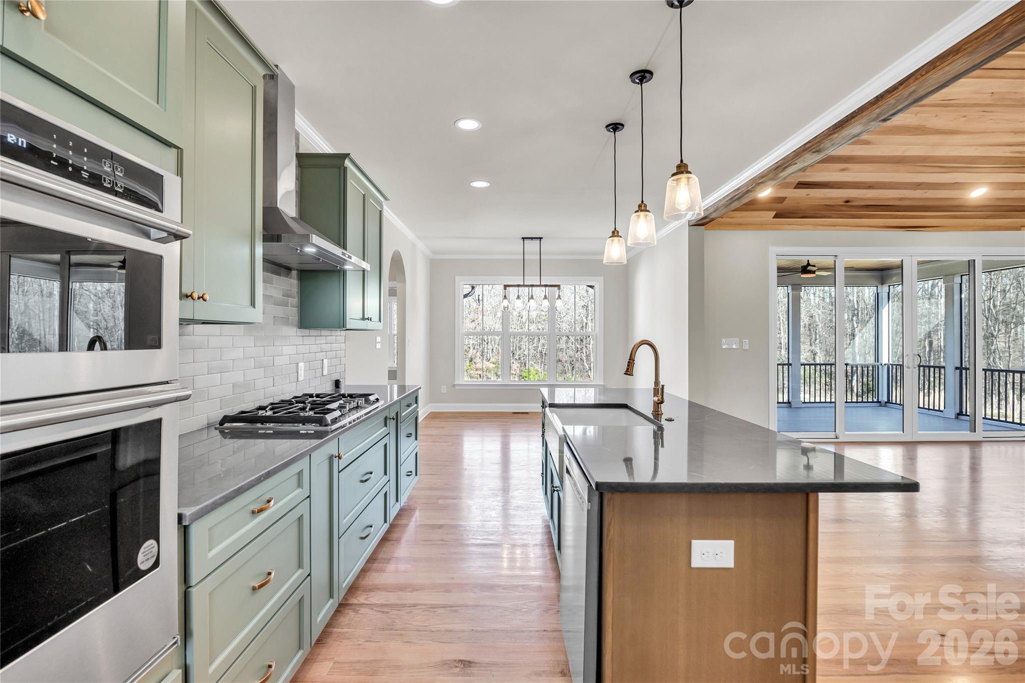 0 Trinity Court Salisbury, NC 28147 - Photo 8 of 38 a kitchen with stainless steel appliances granite countertop a stove a sink and a microwave