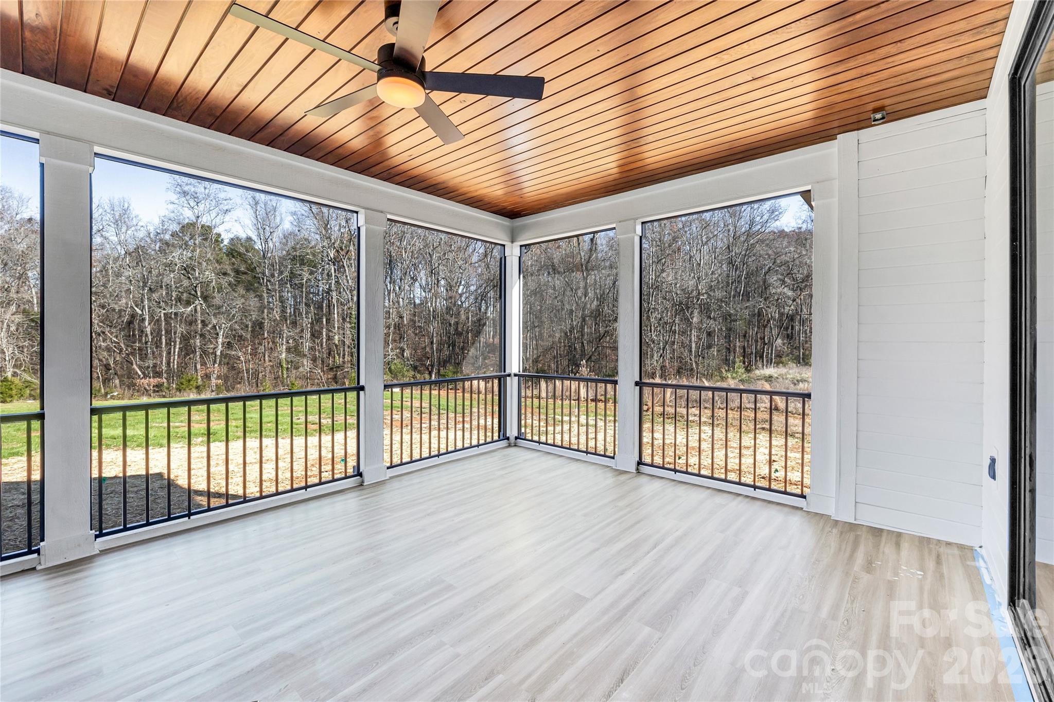 0 Trinity Court Salisbury, NC 28147 - Photo 9 of 38 a view of outdoor room with wooden floor