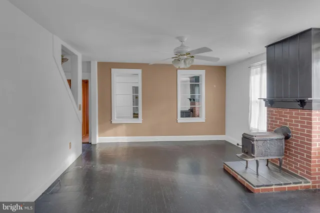 a view of livingroom with furniture and wooden floor