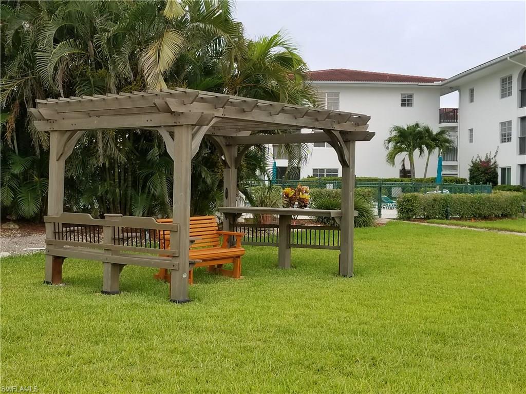 49 High Point Circle South, Unit 101 Naples, FL 34103 - Photo 6 of 8 Rest locations for walking or jogging the perimeter