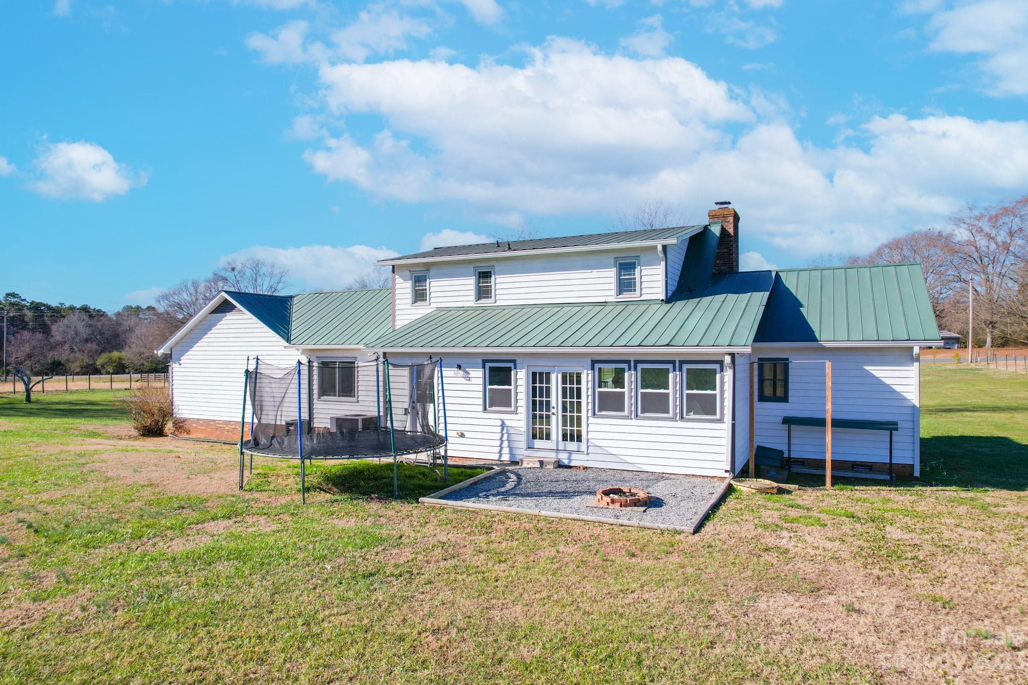 8176 Renee Ford Road Stanfield, NC 28163 - Photo 44 of 48 front view of a house with a yard