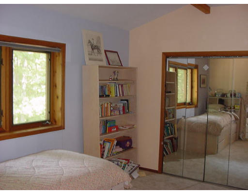 6 Birch Hill Road Pepperell, MA 01463 - Photo 13 of 24 a bedroom with furniture and a window