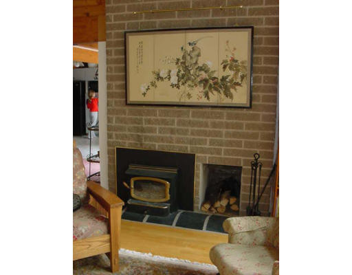 6 Birch Hill Road Pepperell, MA 01463 - Photo 16 of 24 a living room with furniture and a fireplace