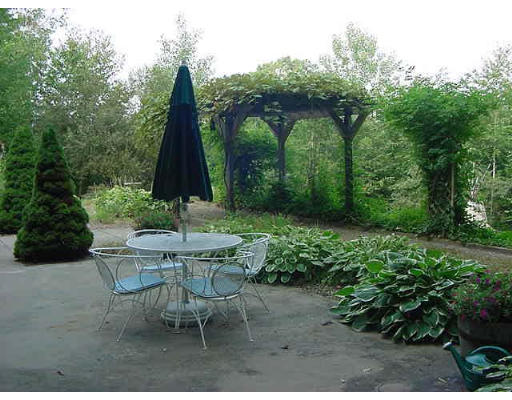 6 Birch Hill Road Pepperell, MA 01463 - Photo 19 of 24 a view of a with a backyard and a slide