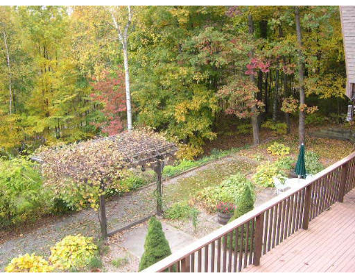 6 Birch Hill Road Pepperell, MA 01463 - Photo 22 of 24 a view of a lake from a balcony