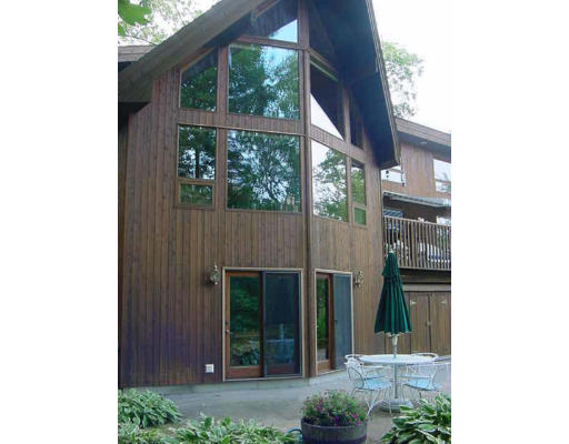 6 Birch Hill Road Pepperell, MA 01463 - Photo 3 of 24 a view of a house with a small garden