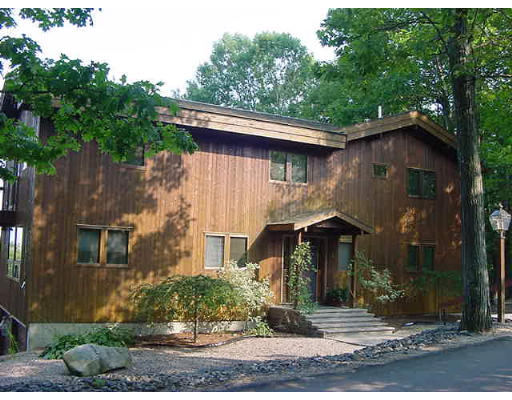 6 Birch Hill Road Pepperell, MA 01463 - Photo 4 of 24 a front view of a house with garden