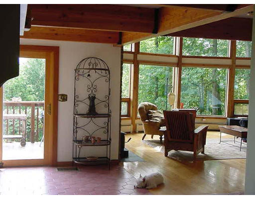 6 Birch Hill Road Pepperell, MA 01463 - Photo 10 of 24 a living room with furniture and a floor to ceiling window