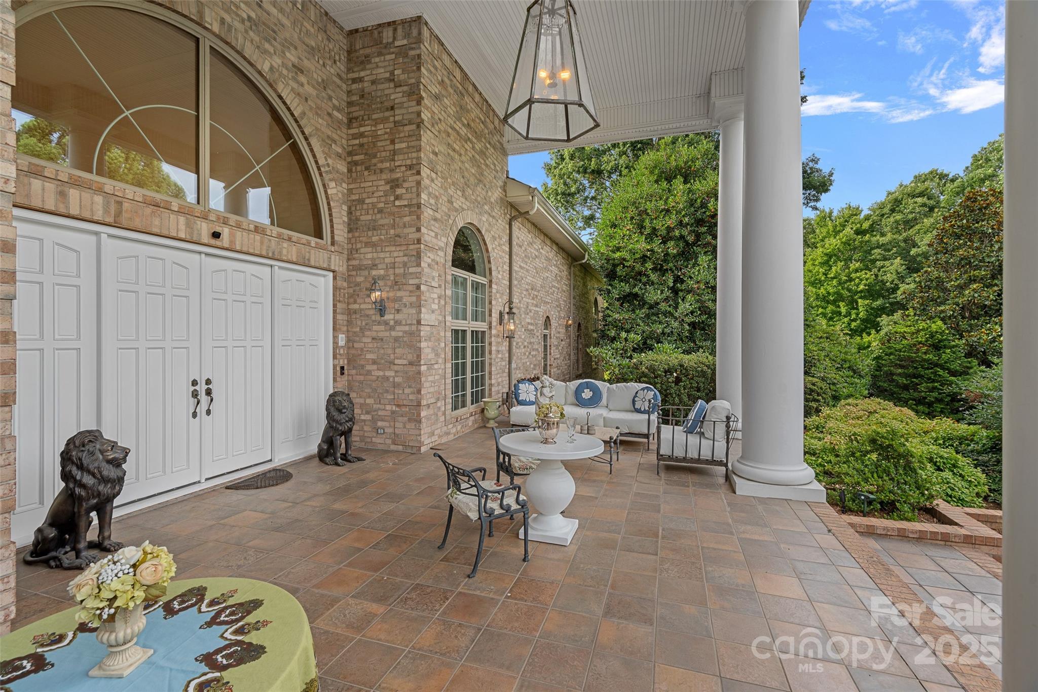 282 Hamilton Drive Columbus, NC 28722 - Photo 12 of 46 a backyard of a house with outdoor seating