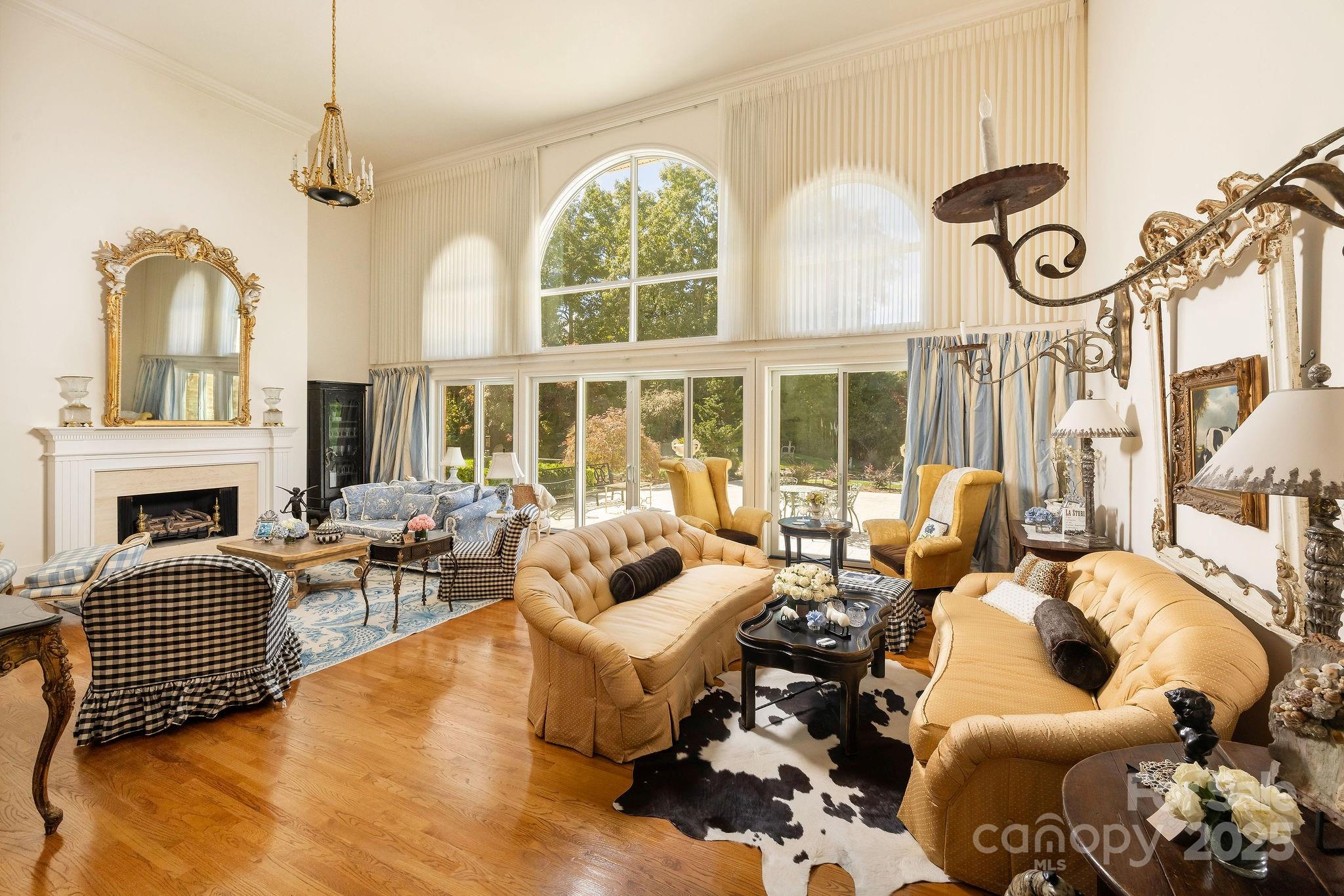 282 Hamilton Drive Columbus, NC 28722 - Photo 15 of 46 a living room with fireplace furniture and a large window