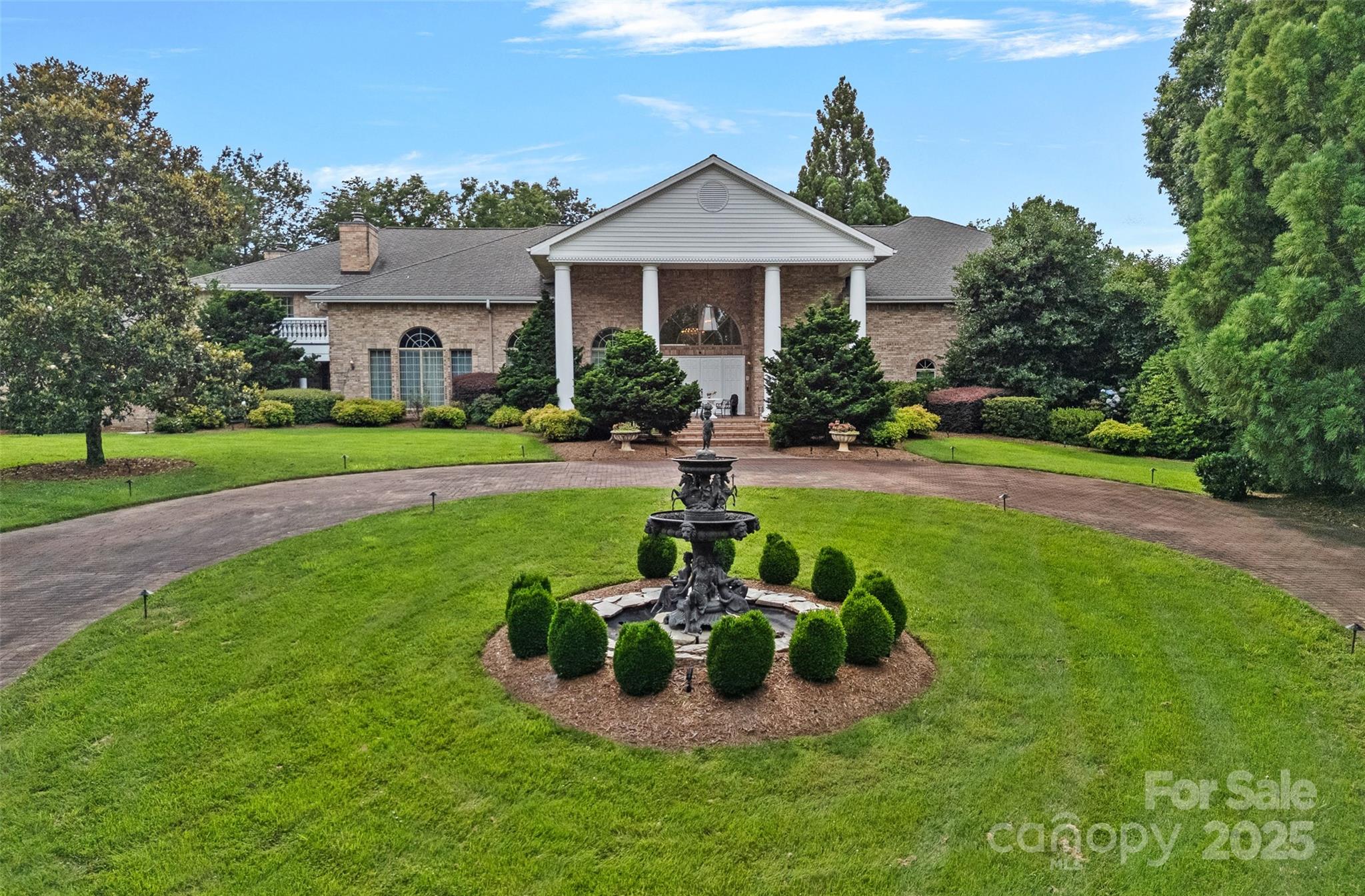 282 Hamilton Drive Columbus, NC 28722 - Photo 2 of 46 a front view of a house with a yard table and chairs