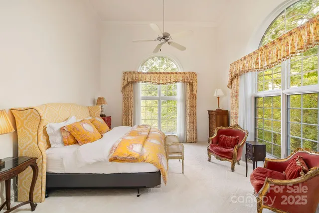 a bedroom with bed and window