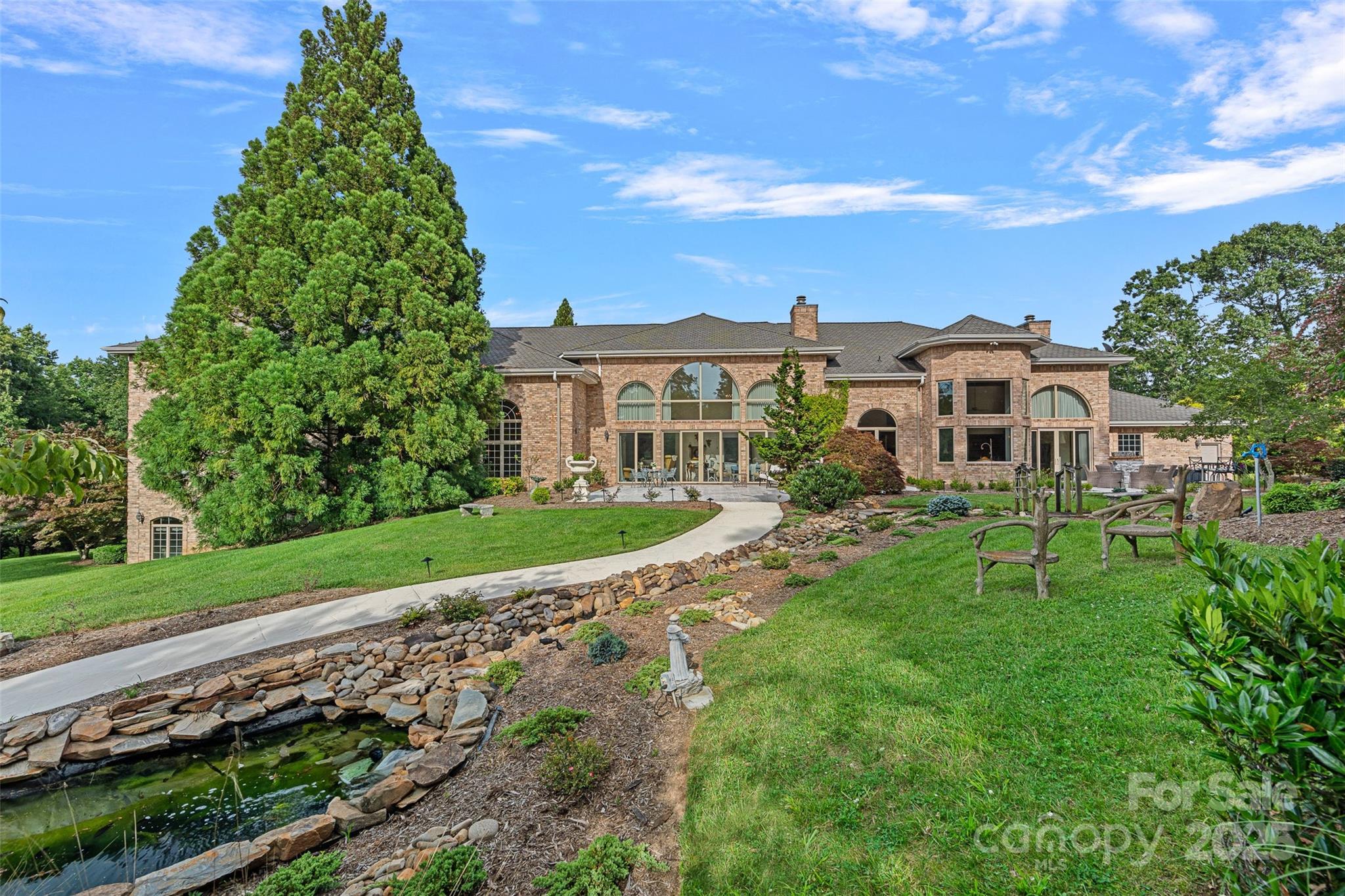 282 Hamilton Drive Columbus, NC 28722 - Photo 30 of 46 a front view of a house with a yard
