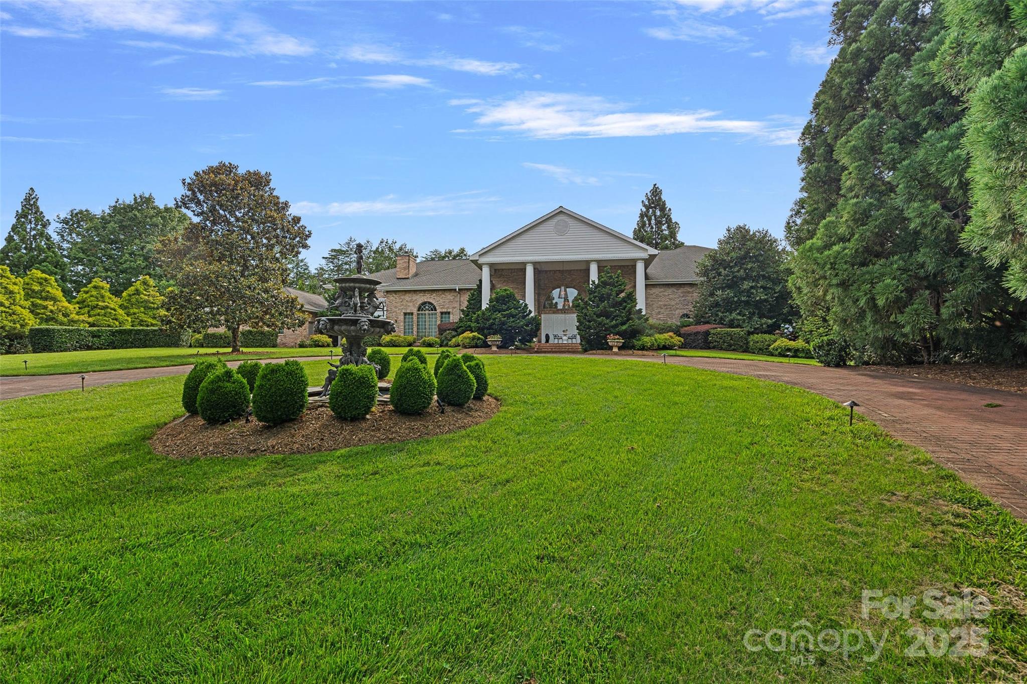 282 Hamilton Drive Columbus, NC 28722 - Photo 3 of 46 a front view of a house with a yard table and chairs