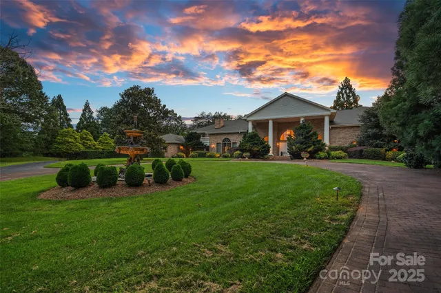 a view of a house with a big yard