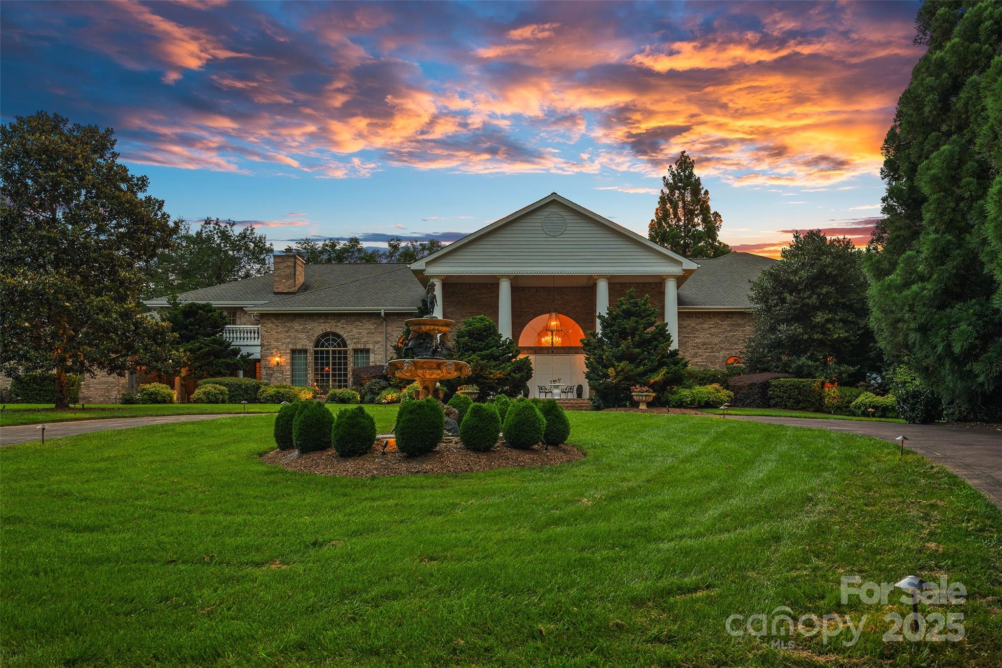 282 Hamilton Drive Columbus, NC 28722 - Photo 37 of 46 a front view of a house with garden