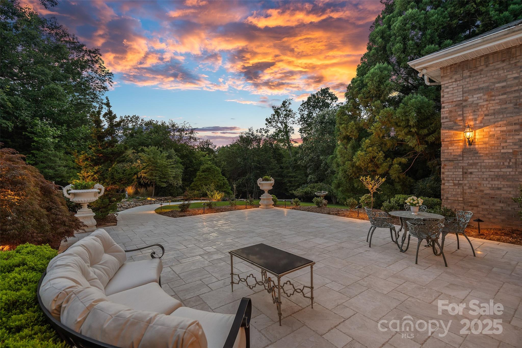 282 Hamilton Drive Columbus, NC 28722 - Photo 45 of 46 a backyard of a house with table and chairs