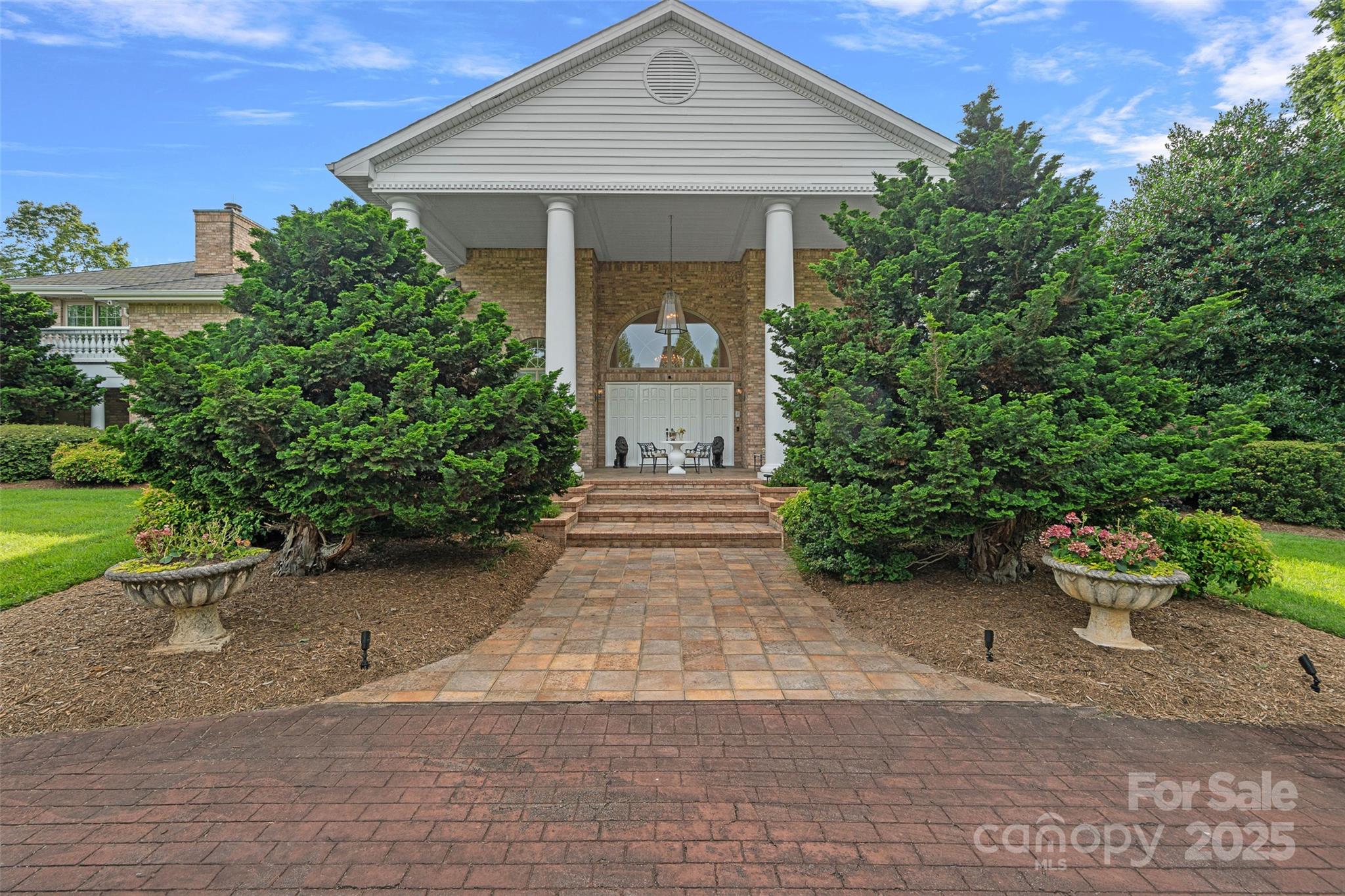 282 Hamilton Drive Columbus, NC 28722 - Photo 9 of 46 a front view of a house with garden