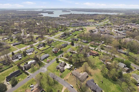 an aerial view of residential building with parking space