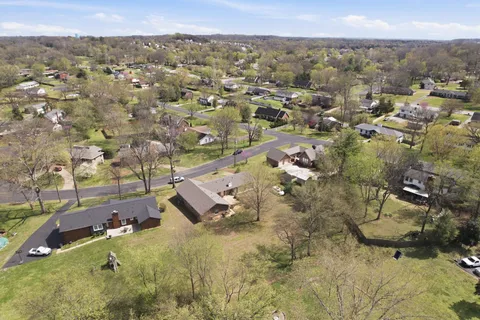 an aerial view of residential house with outdoor space