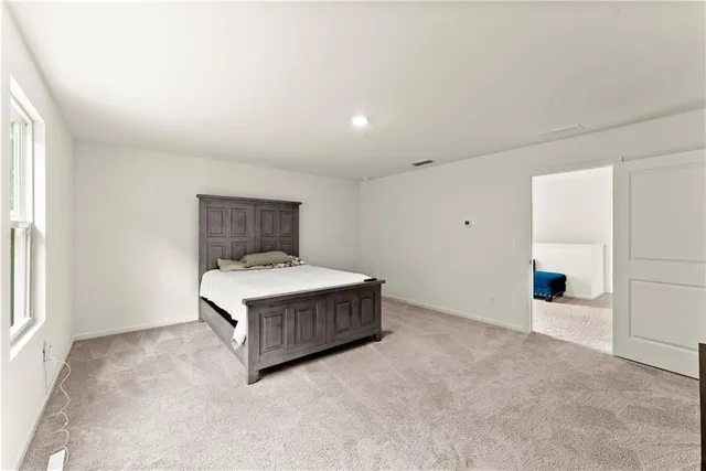 an empty room with a fireplace