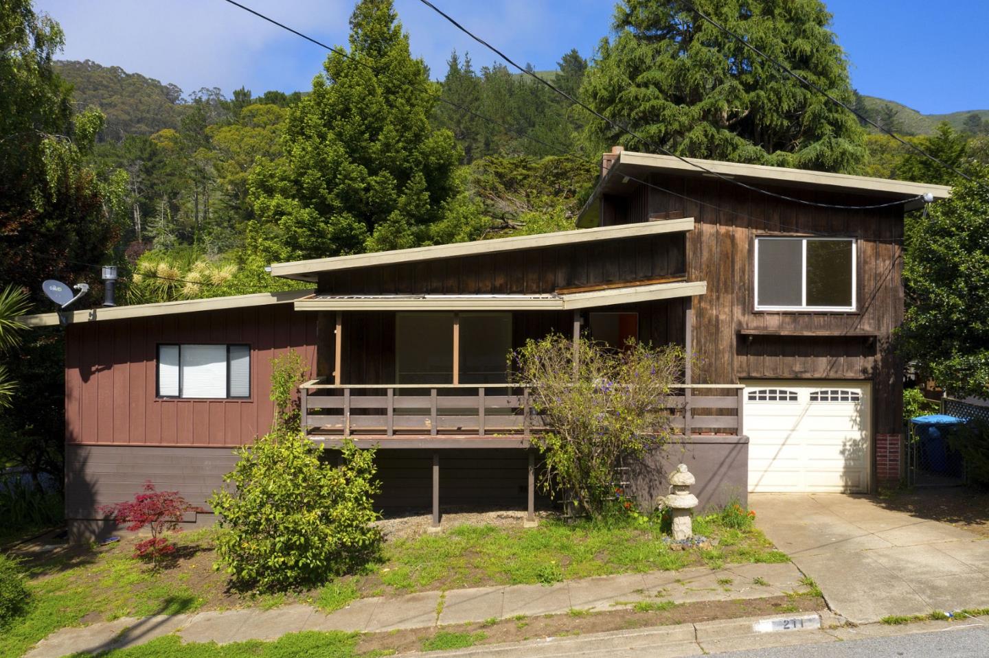 211 Modoc Place Pacifica, CA 94044 - Photo 1 of 25 a front view of a house with yard