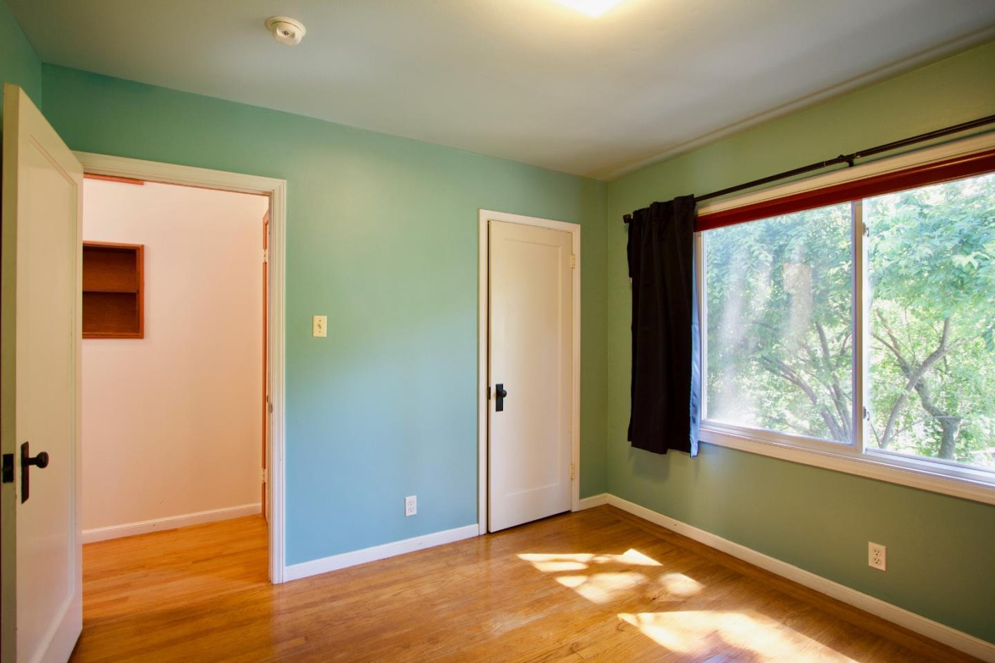 211 Modoc Place Pacifica, CA 94044 - Photo 13 of 25 an empty room with windows