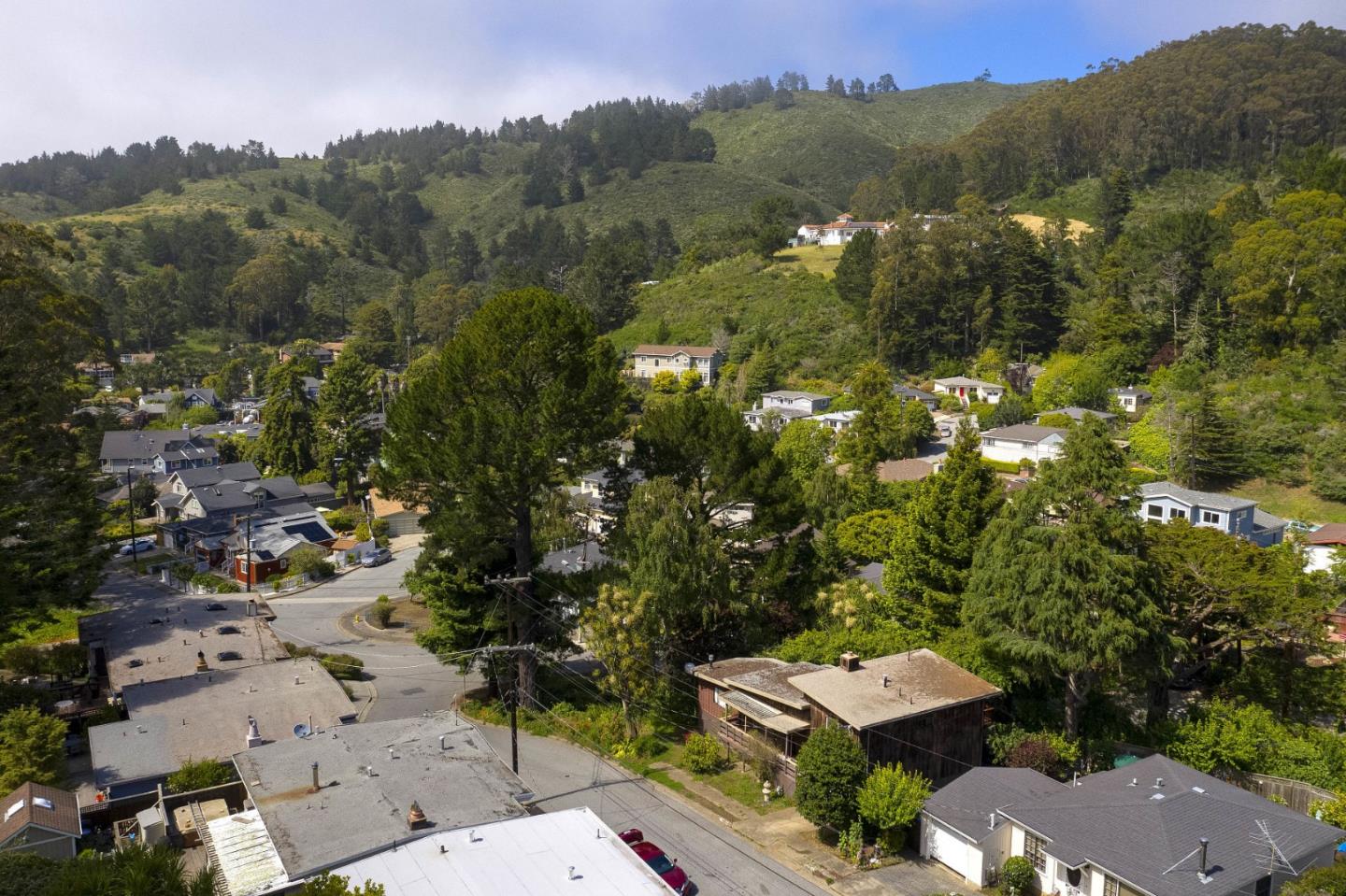 211 Modoc Place Pacifica, CA 94044 - Photo 18 of 25 an aerial view of a city with lots of residential buildings