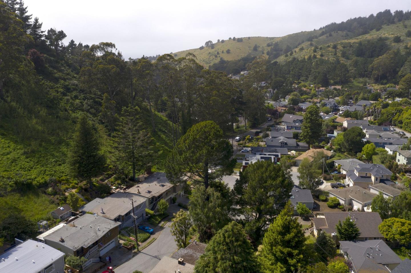 211 Modoc Place Pacifica, CA 94044 - Photo 23 of 25 an aerial view of a house with mountain view