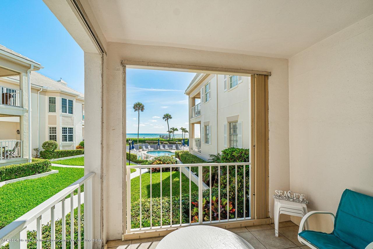 5900 Old Ocean Boulevard, Unit B1 Ocean Ridge, FL 33435 - Photo 2 of 26 a view of a balcony and wooden floor