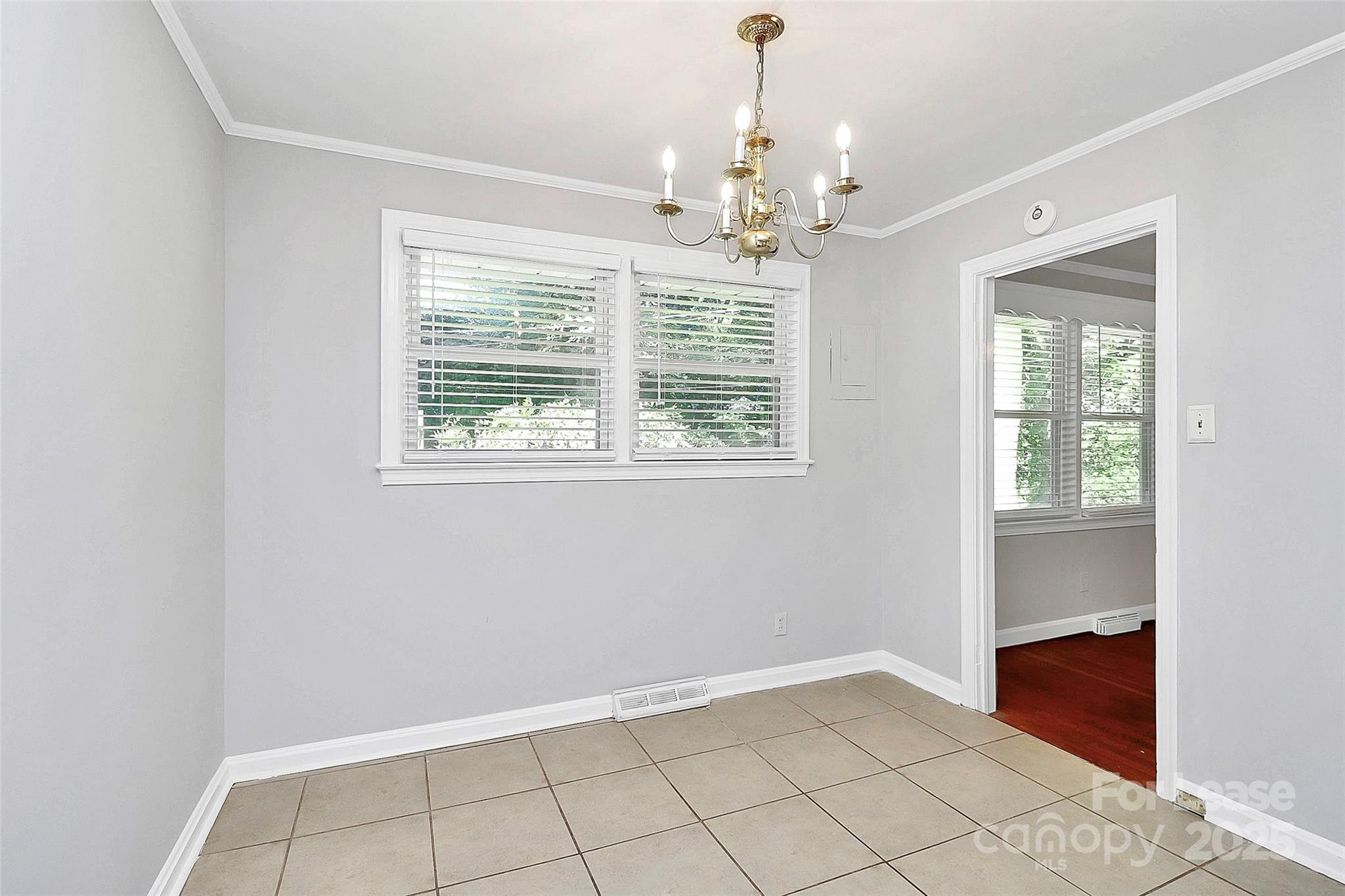 228 Seneca Place Charlotte, NC 28210 - Photo 17 of 34 a view of an empty room with a window