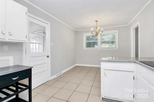 a workspace with chandelier