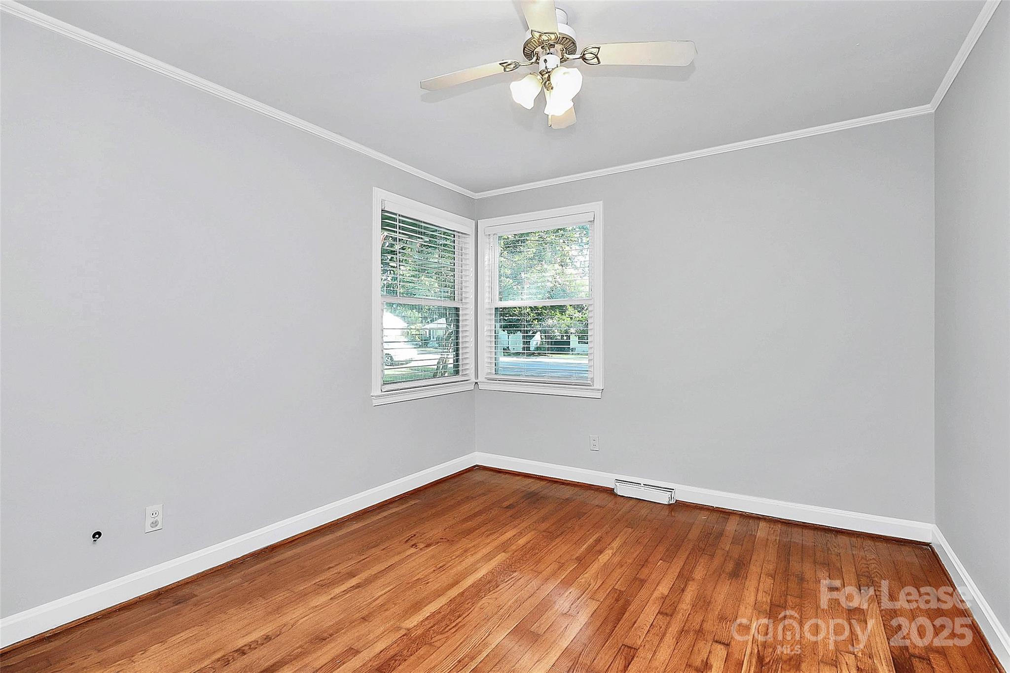 228 Seneca Place Charlotte, NC 28210 - Photo 28 of 34 wooden floor in an empty room with a window