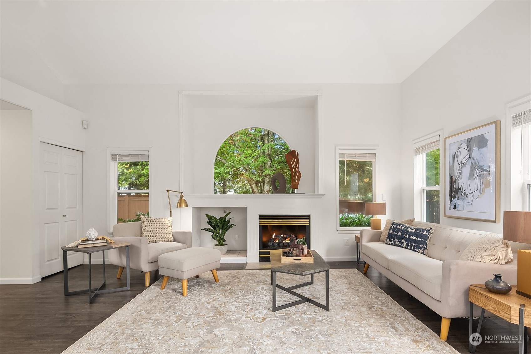 18710 20th Avenue Southeast Bothell, WA 98012 - Photo 15 of 40 a living room with furniture a window and a fireplace