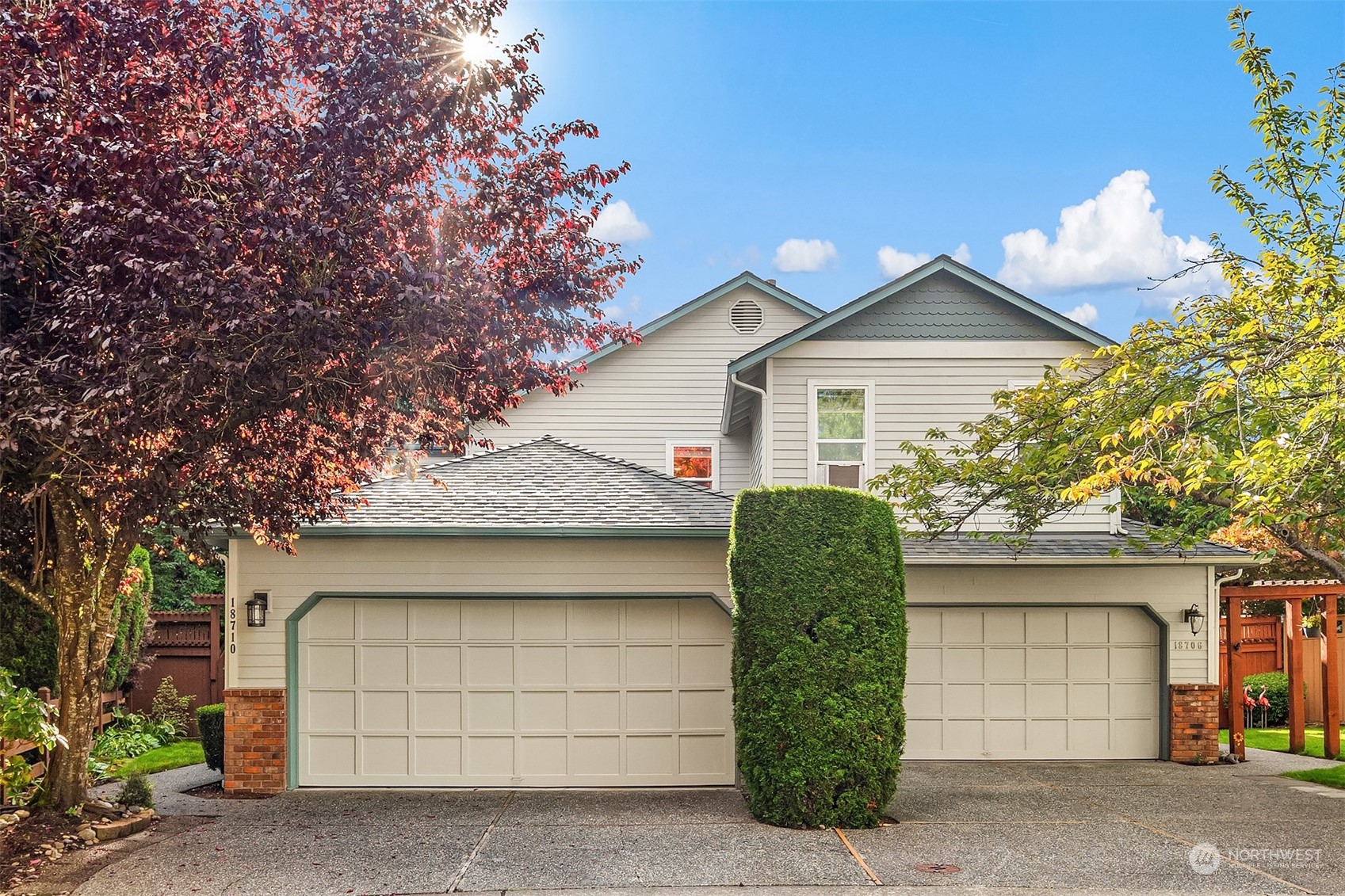 18710 20th Avenue Southeast Bothell, WA 98012 - Photo 2 of 40 a front view of a house with a garage
