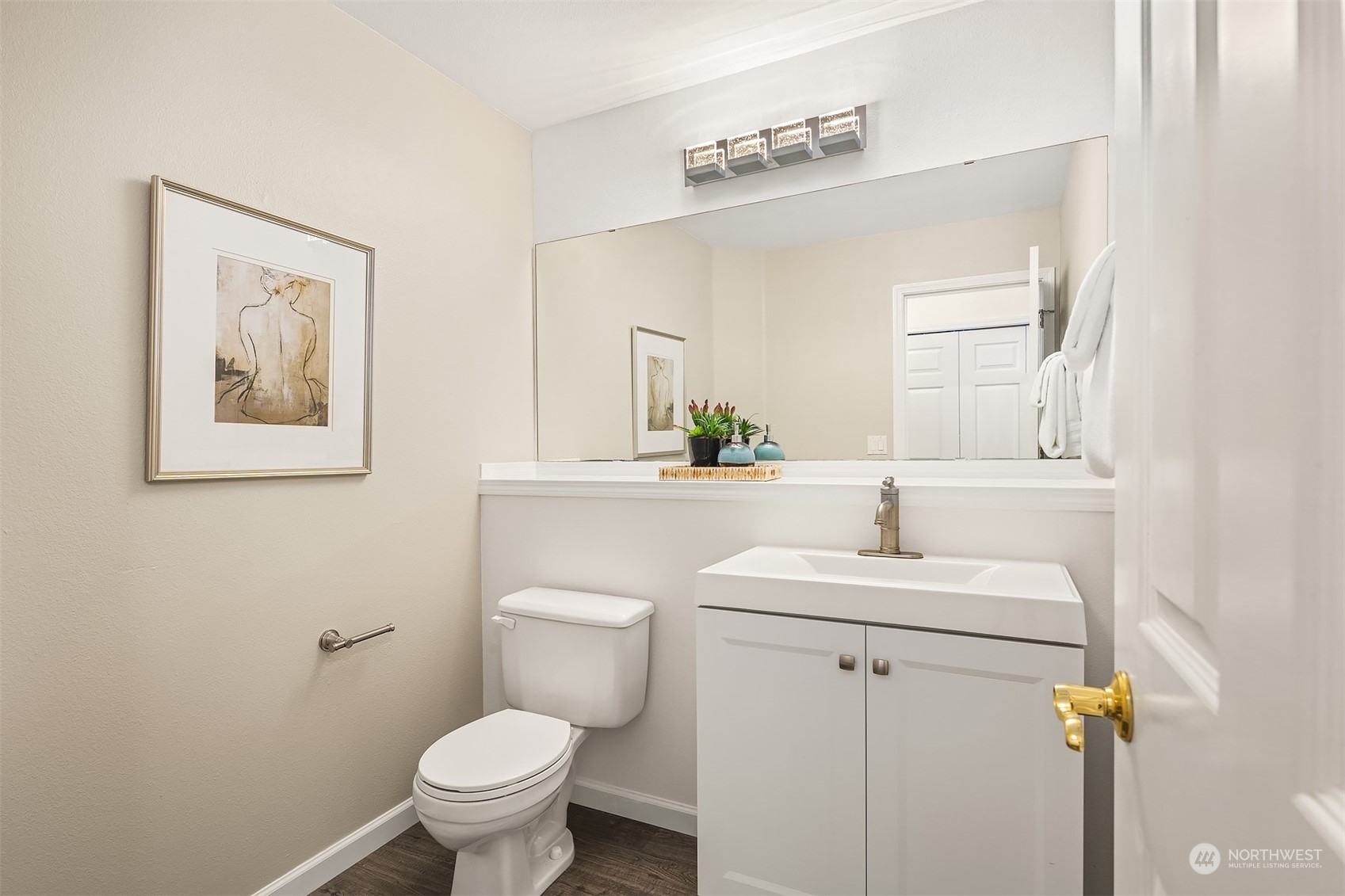 18710 20th Avenue Southeast Bothell, WA 98012 - Photo 27 of 40 a bathroom with a toilet sink and mirror