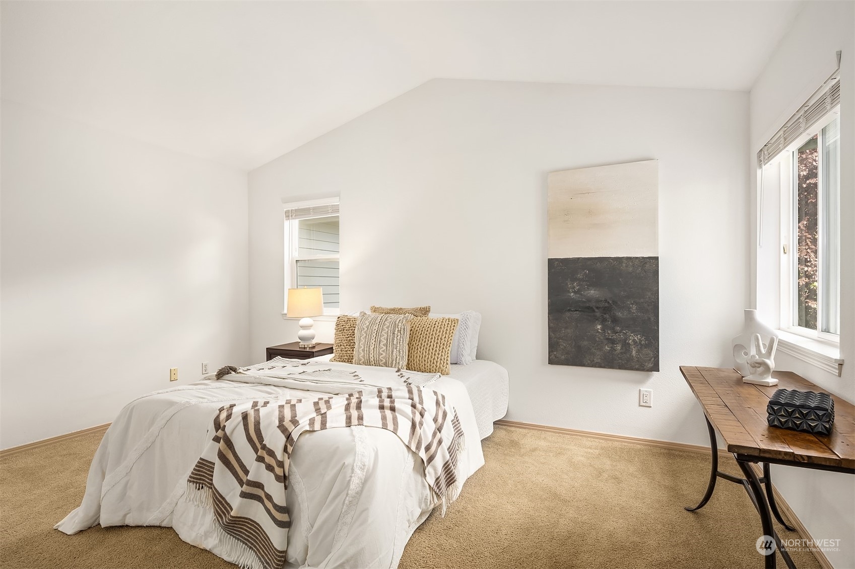 18710 20th Avenue Southeast Bothell, WA 98012 - Photo 29 of 40 a bedroom with a bed and a chair