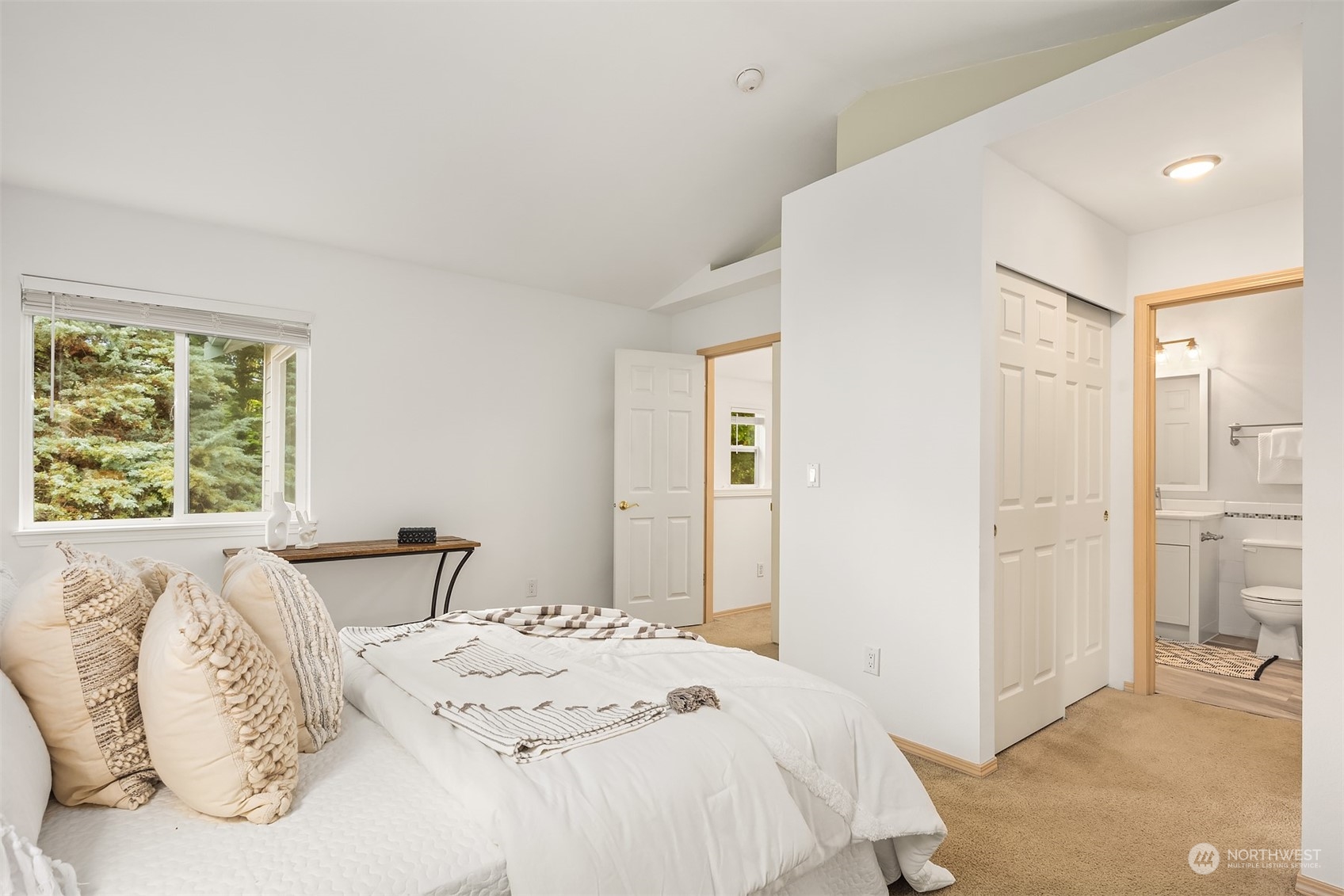 18710 20th Avenue Southeast Bothell, WA 98012 - Photo 30 of 40 a bedroom with a bed and a window