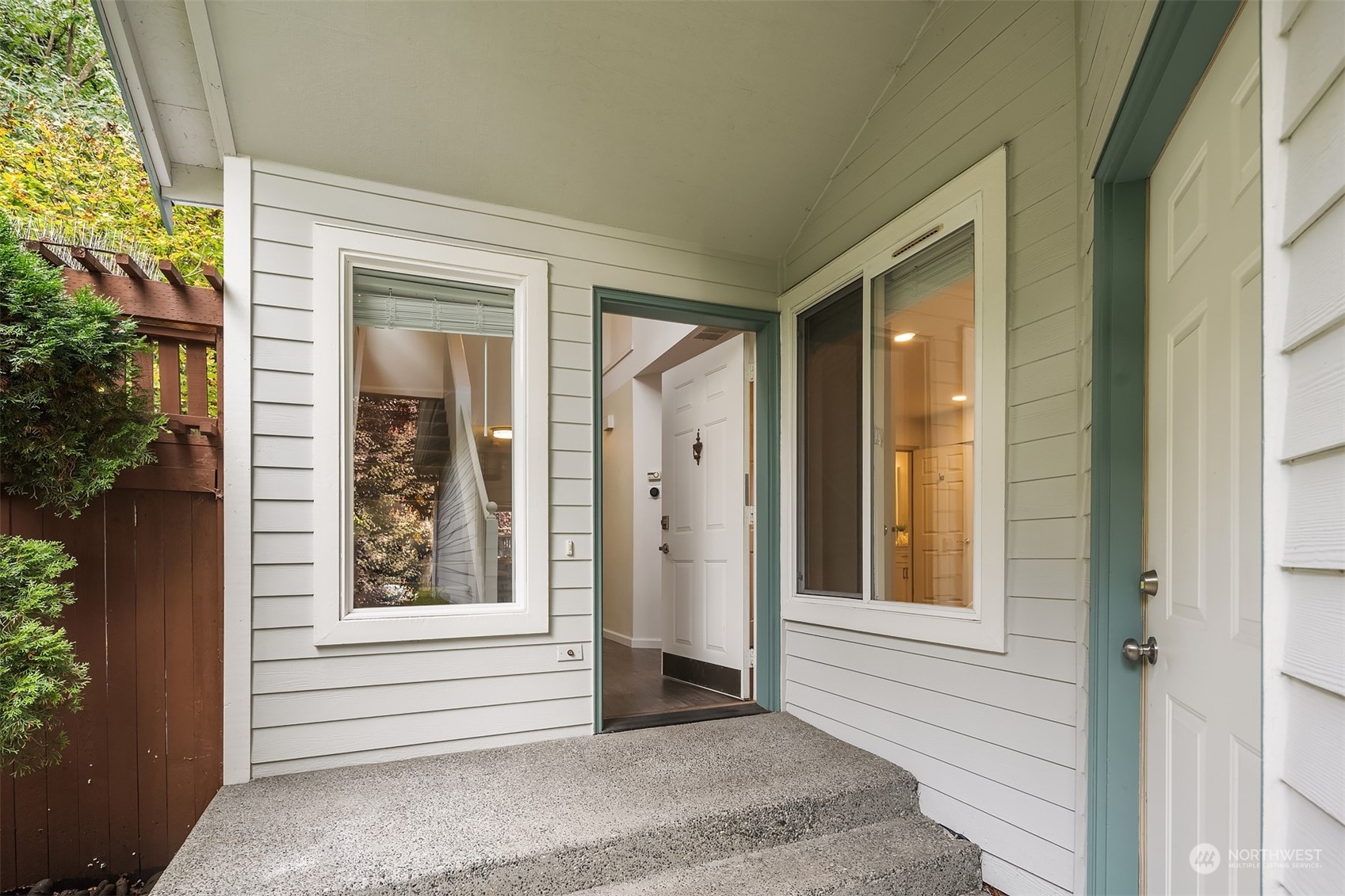 18710 20th Avenue Southeast Bothell, WA 98012 - Photo 5 of 40 a front view of a house with a porch