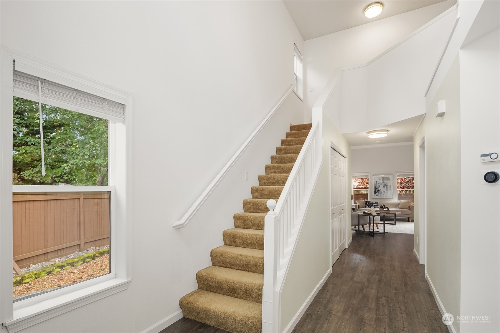 18710 20th Avenue Southeast Bothell, WA 98012 - Photo 6 of 40 a view of entryway and hall with wooden floor