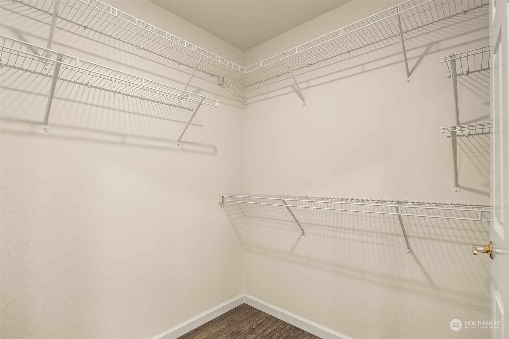 18710 20th Avenue Southeast Bothell, WA 98012 - Photo 9 of 40 a view of a room with racks on the wall
