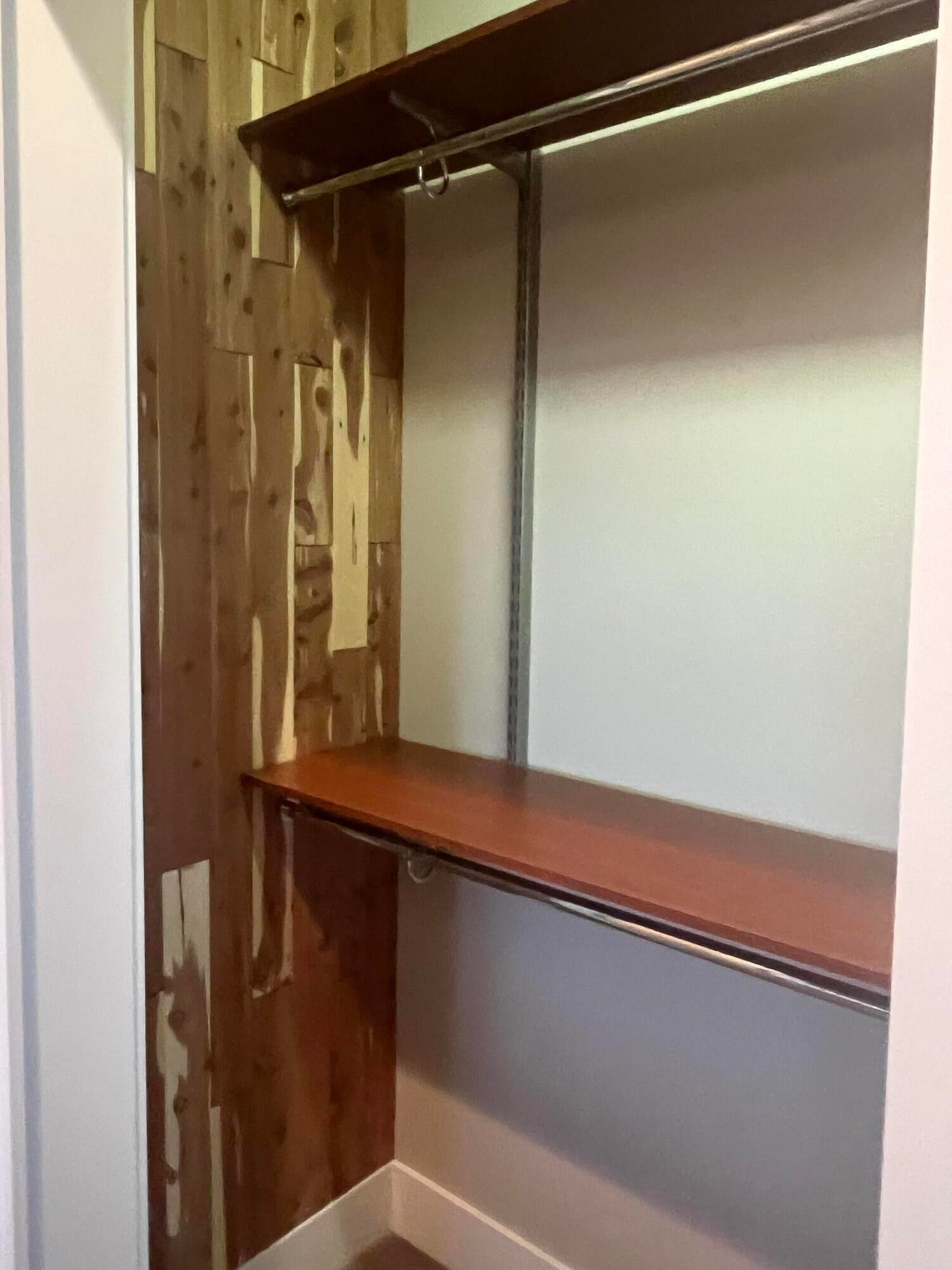 983 Highland View Loop Redmond, OR 97756 - Photo 72 of 124 Cedar storage closet in lower hallway.