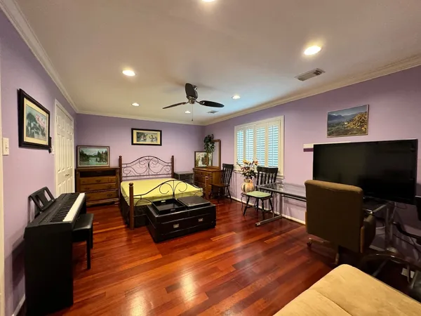 a dining room with a sink a table and chairs