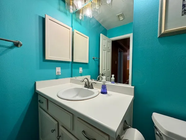 a bathroom with a shower and a toilet