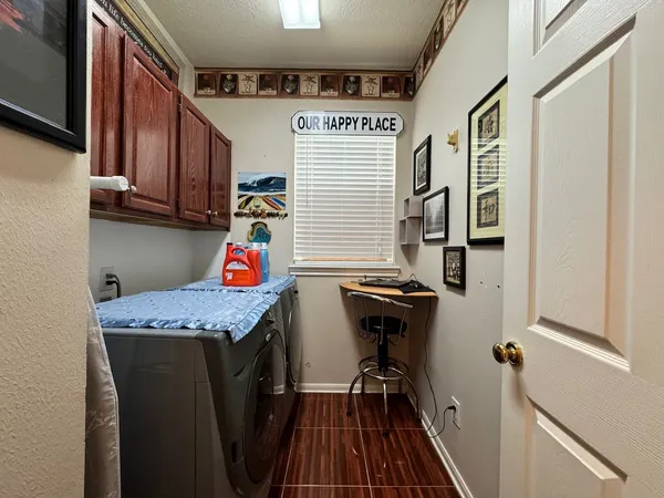 a view of road with large trees