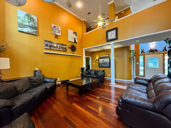 a living room with furniture and a fireplace