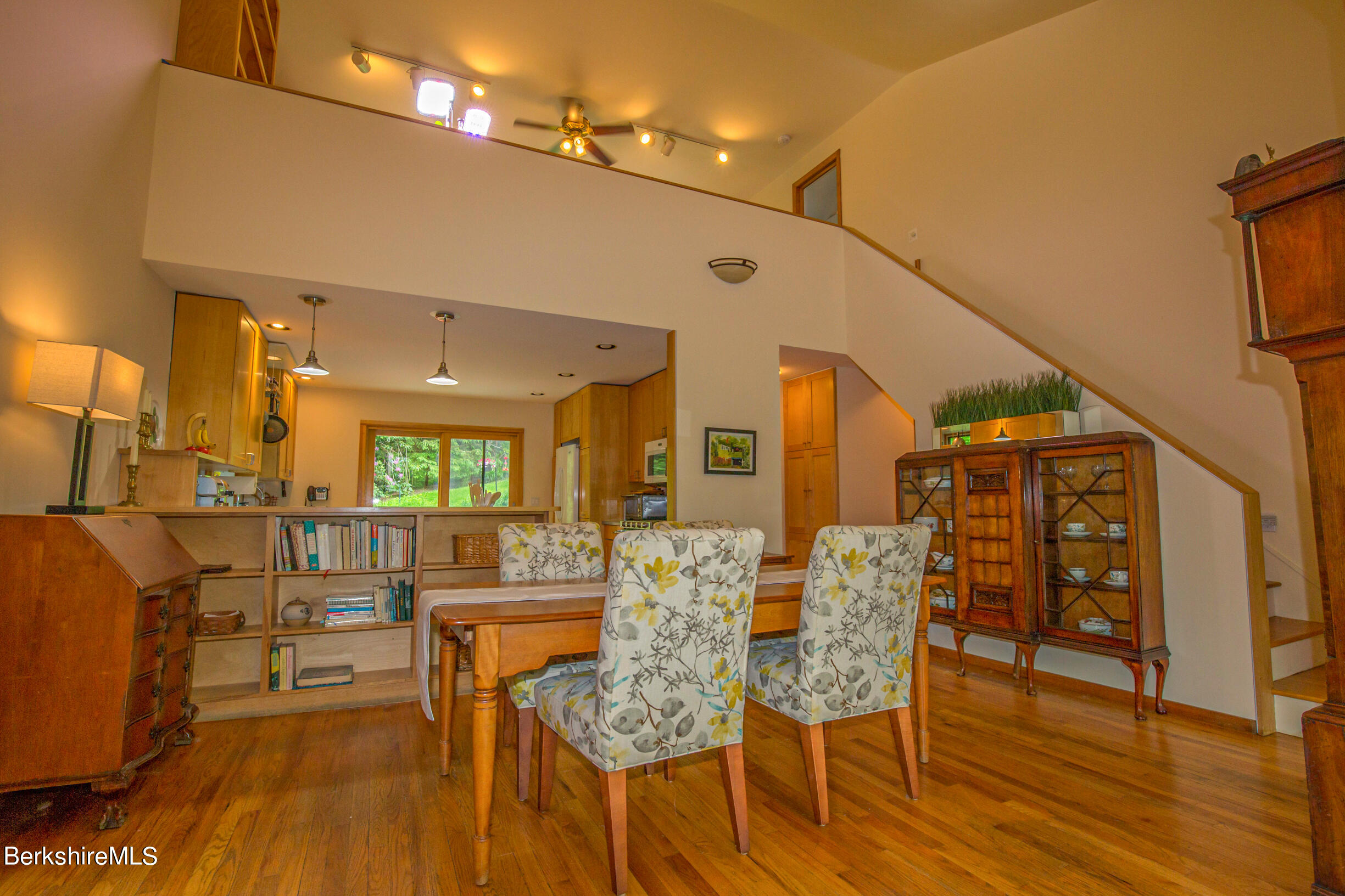 39 Lake Rd Extension Richmond, MA 01201 - Photo 11 of 47 a view of a dining room with furniture and wooden floor